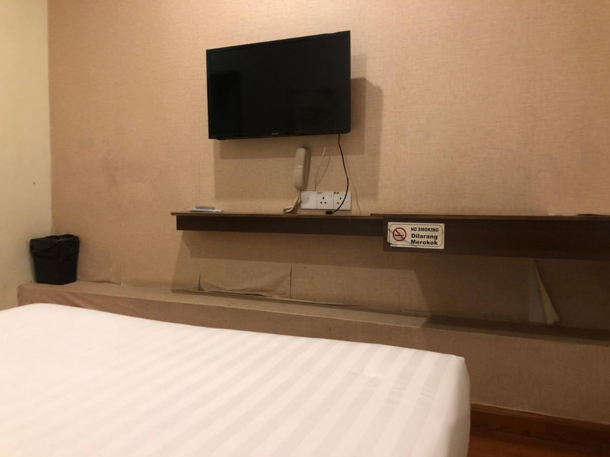 Super Oyo 90668 Joy Inn Мири Екстериор снимка