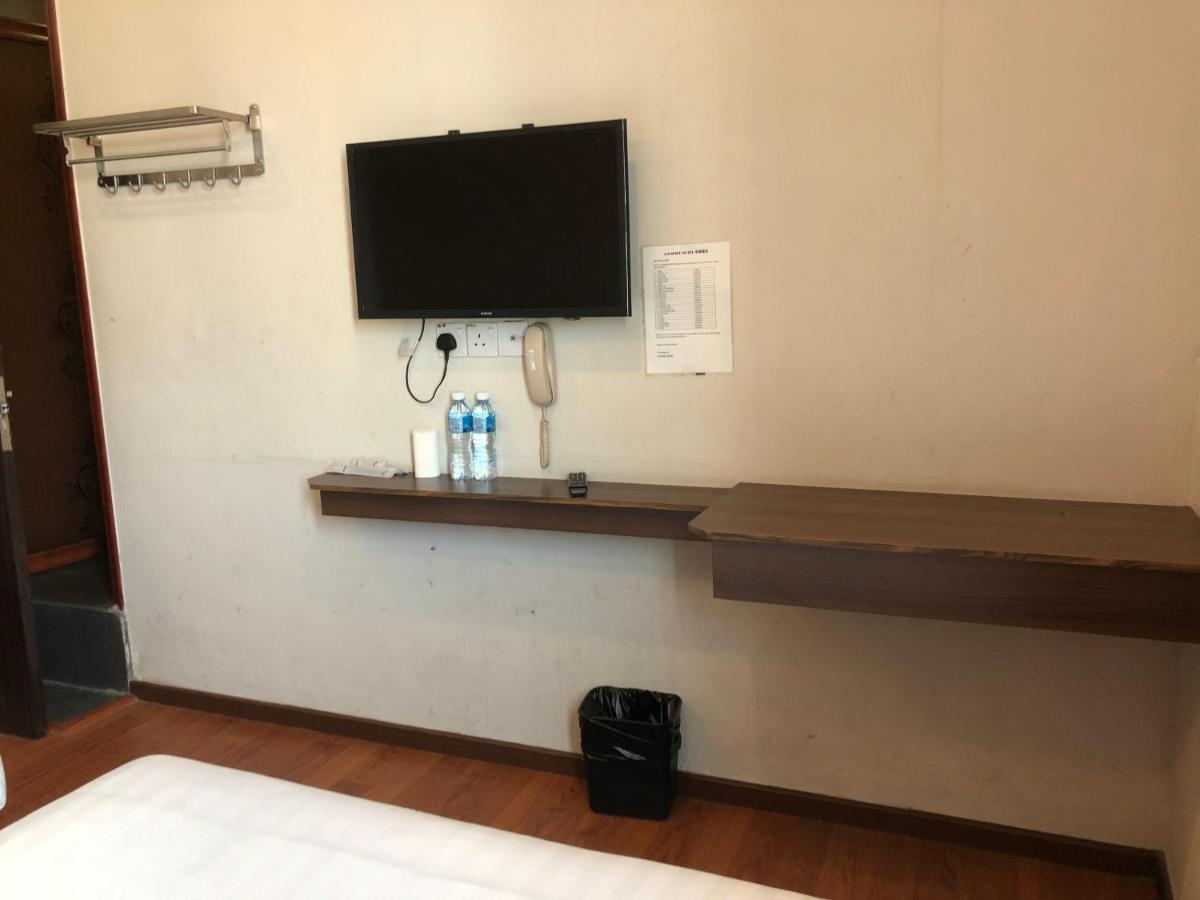 Super Oyo 90668 Joy Inn Мири Екстериор снимка